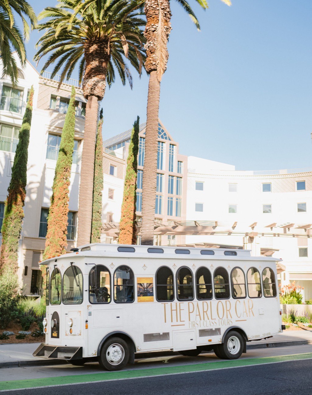 The trolley under LA palm trees