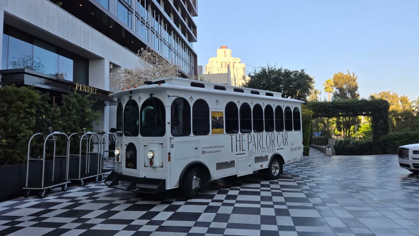 The Parlor Car trolley at a luxury hotel entrance in West Hollywood