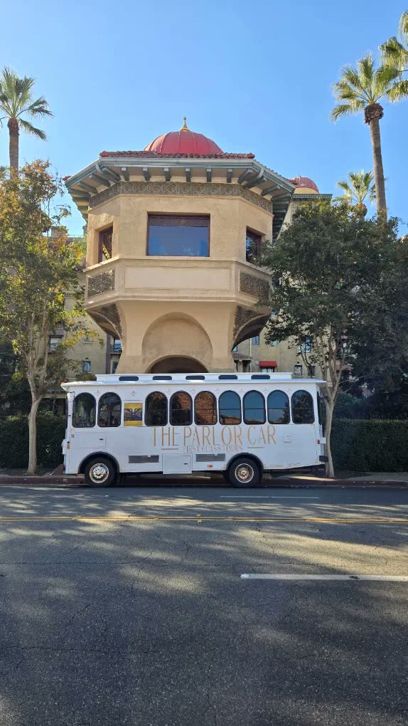 The Parlor Car trolley at a palm-lined Orange County destination
