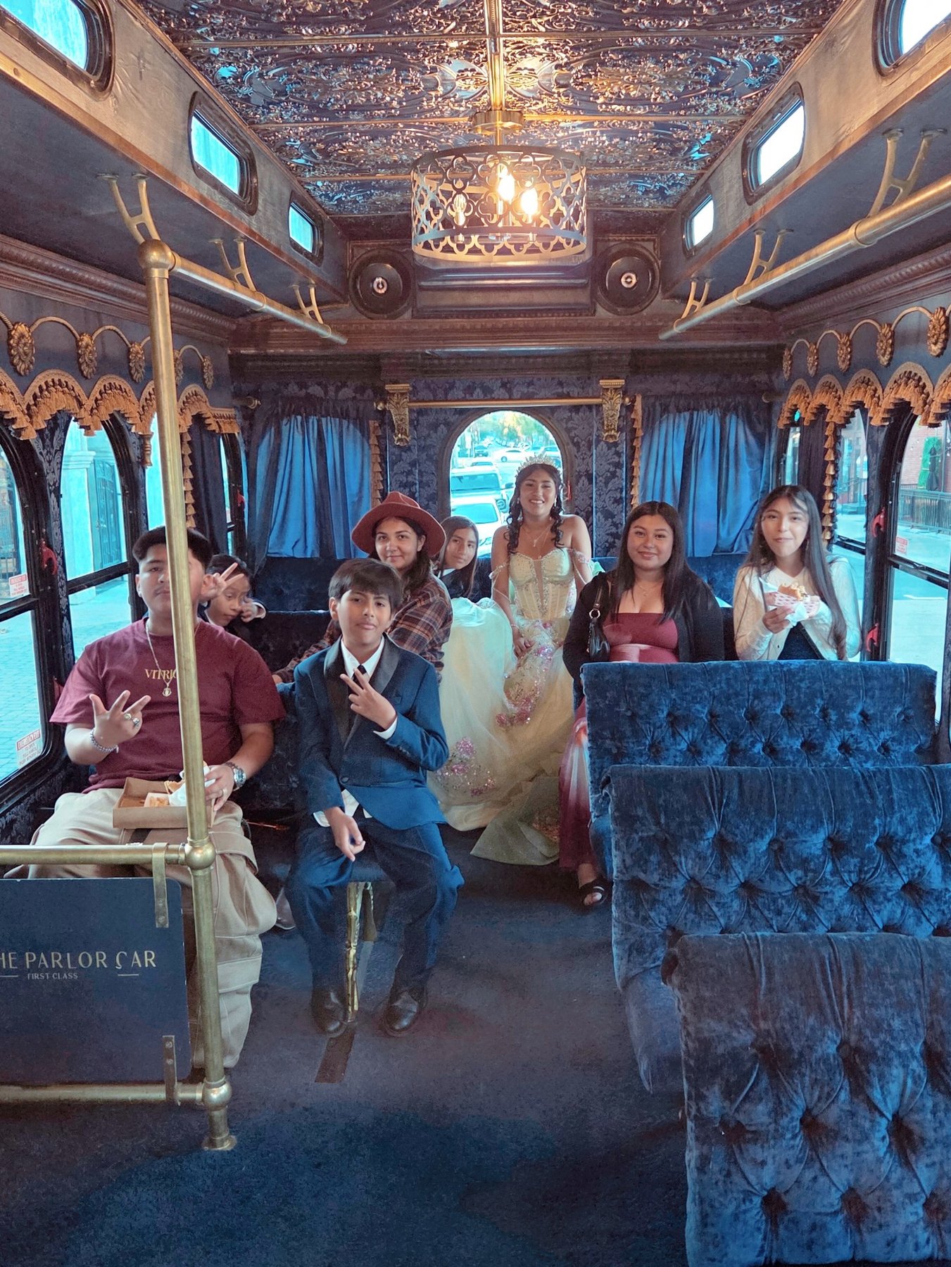 Quinceañera party celebrating aboard The Parlor Car trolley in Los Angeles